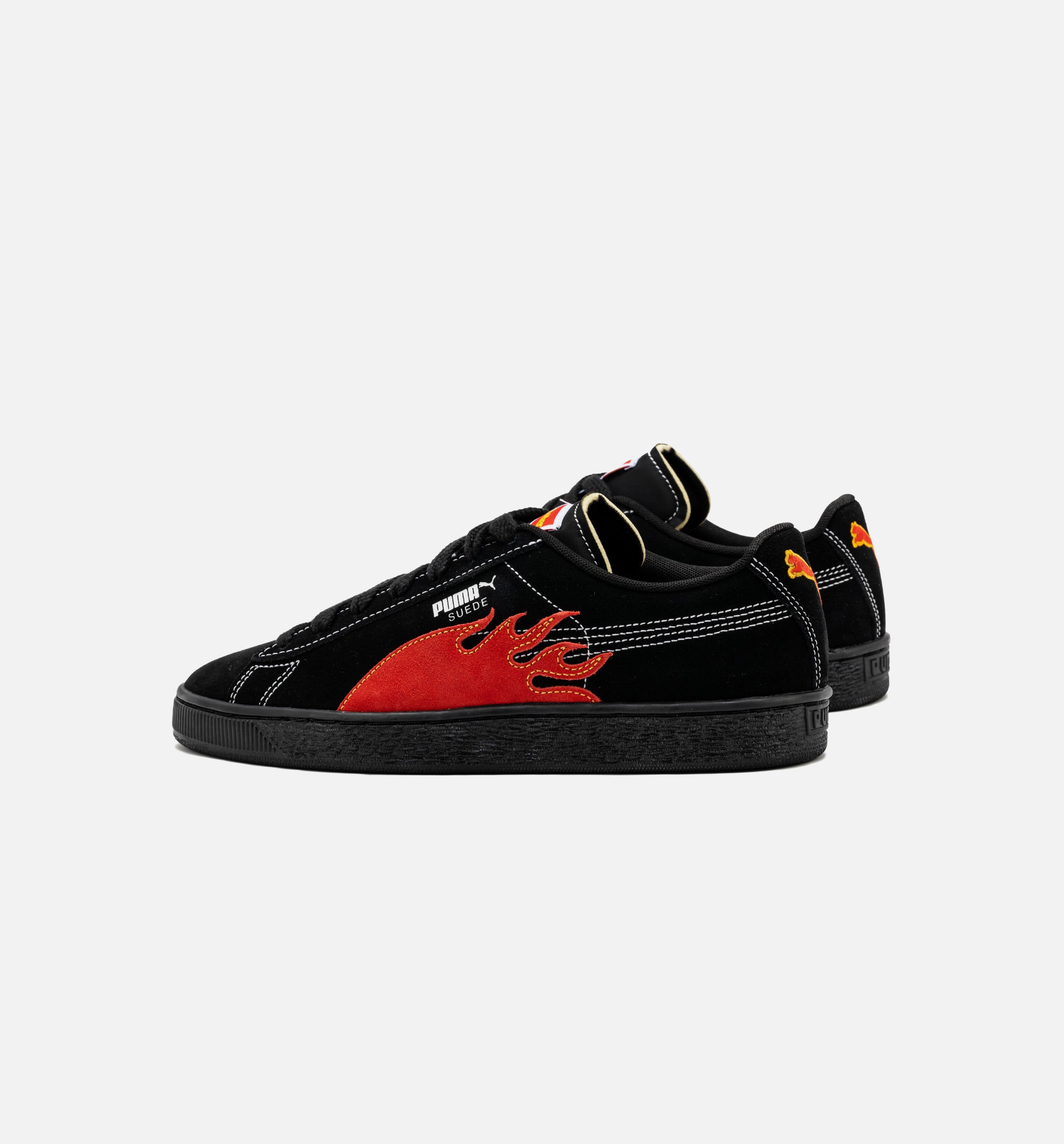 black and red suede pumas